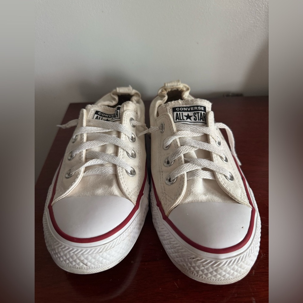 Converse women’s slip on White and Red Sneakers